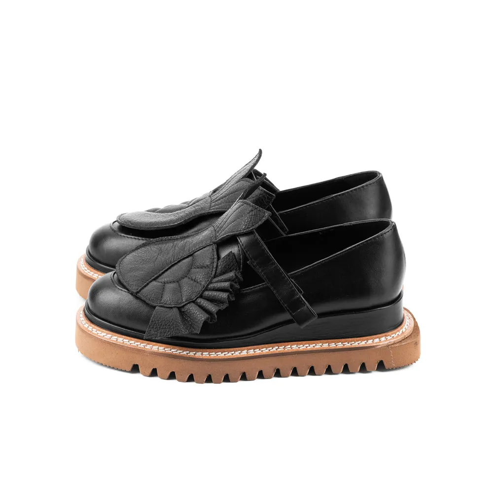 The Answer Within black leather loafers