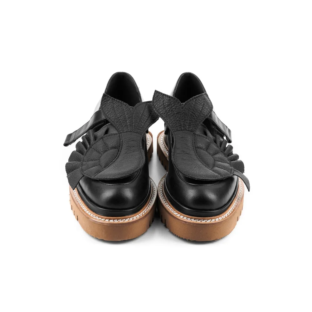 The Answer Within black leather loafers